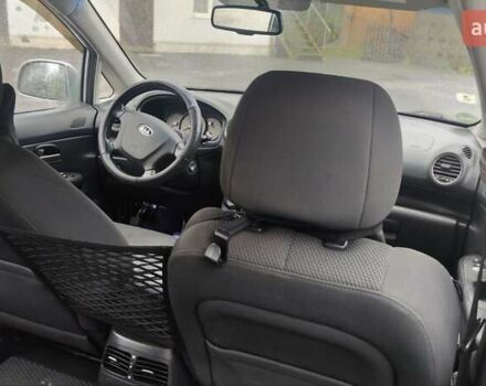 Серый Киа Каренс, объемом двигателя 2 л и пробегом 249 тыс. км за 7850 $, фото 10 на Automoto.ua