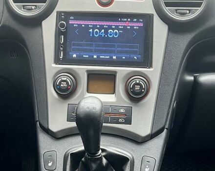 Серый Киа Каренс, объемом двигателя 2 л и пробегом 173 тыс. км за 6700 $, фото 16 на Automoto.ua