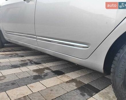 Серый Киа Каренс, объемом двигателя 2 л и пробегом 163 тыс. км за 5400 $, фото 27 на Automoto.ua