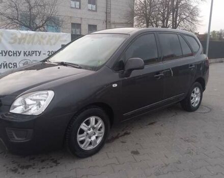 Серый Киа Каренс, объемом двигателя 2 л и пробегом 258 тыс. км за 5200 $, фото 3 на Automoto.ua