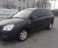 Серый Киа Каренс, объемом двигателя 2 л и пробегом 258 тыс. км за 5200 $, фото 3 на Automoto.ua