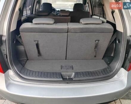 Серый Киа Каренс, объемом двигателя 2 л и пробегом 163 тыс. км за 5400 $, фото 46 на Automoto.ua