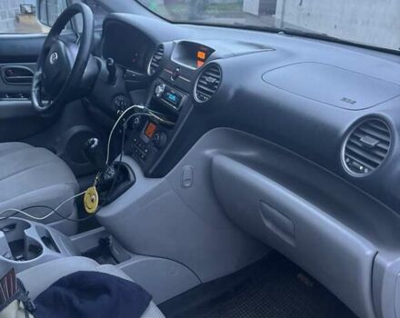 Серый Киа Каренс, объемом двигателя 2 л и пробегом 275 тыс. км за 4250 $, фото 1 на Automoto.ua