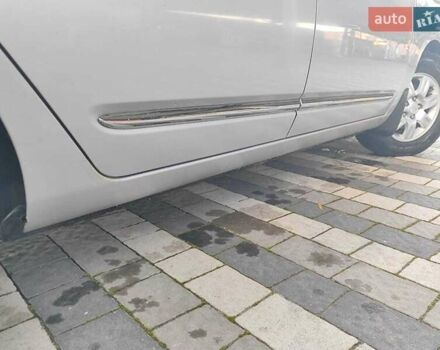 Серый Киа Каренс, объемом двигателя 2 л и пробегом 163 тыс. км за 5400 $, фото 28 на Automoto.ua