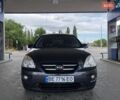 Серый Киа Каренс, объемом двигателя 2 л и пробегом 285 тыс. км за 6500 $, фото 1 на Automoto.ua