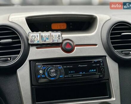 Серый Киа Каренс, объемом двигателя 2 л и пробегом 203 тыс. км за 5999 $, фото 18 на Automoto.ua