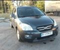 Серый Киа Каренс, объемом двигателя 2 л и пробегом 198 тыс. км за 5800 $, фото 1 на Automoto.ua