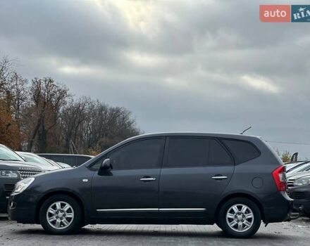 Серый Киа Каренс, объемом двигателя 2 л и пробегом 203 тыс. км за 5999 $, фото 4 на Automoto.ua
