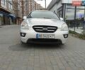 Серый Киа Каренс, объемом двигателя 2 л и пробегом 110 тыс. км за 5600 $, фото 1 на Automoto.ua