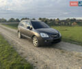 Серый Киа Каренс, объемом двигателя 2 л и пробегом 300 тыс. км за 6900 $, фото 1 на Automoto.ua