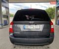 Серый Киа Каренс, объемом двигателя 2 л и пробегом 285 тыс. км за 6500 $, фото 5 на Automoto.ua