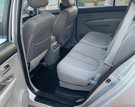 Серый Киа Каренс, объемом двигателя 2 л и пробегом 198 тыс. км за 6800 $, фото 8 на Automoto.ua