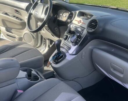 Сірий Кіа Каренс, об'ємом двигуна 2 л та пробігом 273 тис. км за 6300 $, фото 12 на Automoto.ua