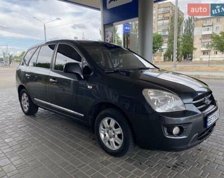 Серый Киа Каренс, объемом двигателя 2 л и пробегом 285 тыс. км за 6500 $, фото 2 на Automoto.ua
