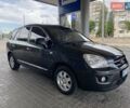 Серый Киа Каренс, объемом двигателя 2 л и пробегом 285 тыс. км за 6500 $, фото 2 на Automoto.ua