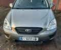 Серый Киа Каренс, объемом двигателя 2 л и пробегом 180 тыс. км за 6900 $, фото 1 на Automoto.ua