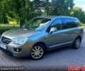 Серый Киа Каренс, объемом двигателя 2 л и пробегом 267 тыс. км за 7000 $, фото 1 на Automoto.ua
