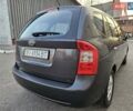 Серый Киа Каренс, объемом двигателя 2 л и пробегом 284 тыс. км за 5900 $, фото 5 на Automoto.ua