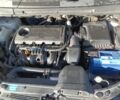 Серый Киа Каренс, объемом двигателя 2 л и пробегом 238 тыс. км за 5800 $, фото 2 на Automoto.ua