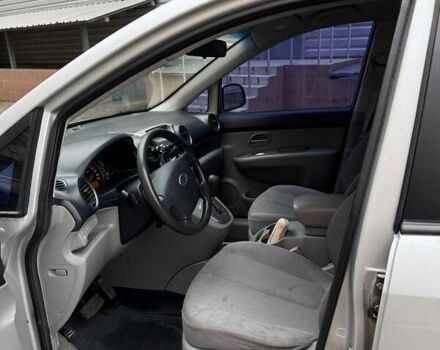 Серый Киа Каренс, объемом двигателя 2 л и пробегом 131 тыс. км за 8200 $, фото 13 на Automoto.ua