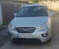 Серый Киа Каренс, объемом двигателя 2 л и пробегом 208 тыс. км за 6500 $, фото 1 на Automoto.ua