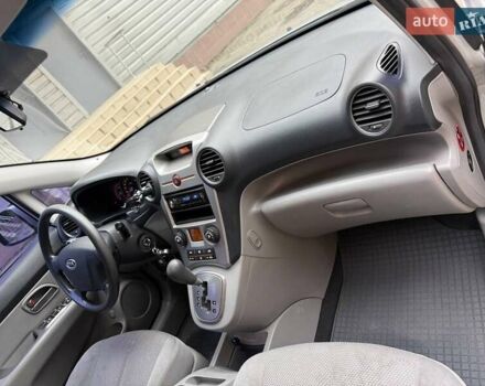 Серый Киа Каренс, объемом двигателя 2 л и пробегом 131 тыс. км за 8200 $, фото 16 на Automoto.ua