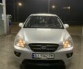 Серый Киа Каренс, объемом двигателя 2 л и пробегом 250 тыс. км за 5800 $, фото 1 на Automoto.ua