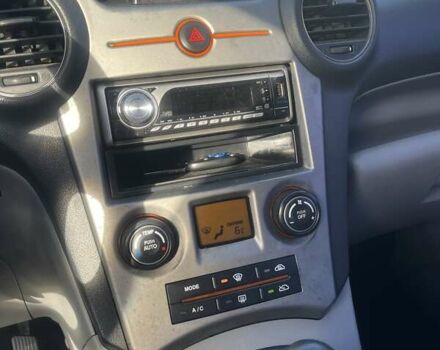 Сірий Кіа Каренс, об'ємом двигуна 2 л та пробігом 273 тис. км за 6300 $, фото 17 на Automoto.ua