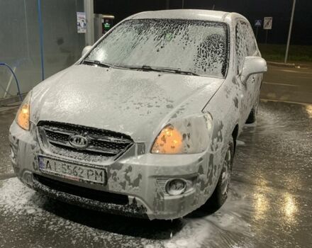 Серый Киа Каренс, объемом двигателя 2 л и пробегом 250 тыс. км за 5800 $, фото 1 на Automoto.ua