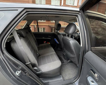 Серый Киа Каренс, объемом двигателя 2 л и пробегом 305 тыс. км за 5900 $, фото 11 на Automoto.ua