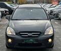 Серый Киа Каренс, объемом двигателя 2 л и пробегом 203 тыс. км за 5999 $, фото 2 на Automoto.ua