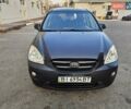 Серый Киа Каренс, объемом двигателя 2 л и пробегом 284 тыс. км за 5900 $, фото 1 на Automoto.ua