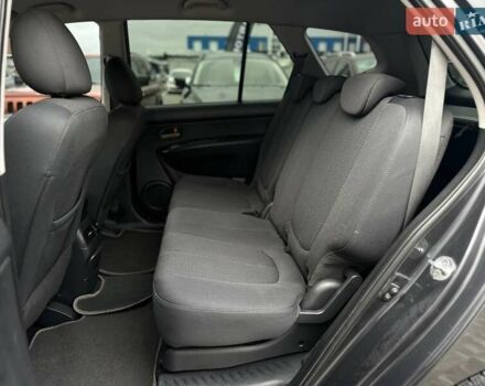 Серый Киа Каренс, объемом двигателя 2 л и пробегом 203 тыс. км за 5999 $, фото 14 на Automoto.ua