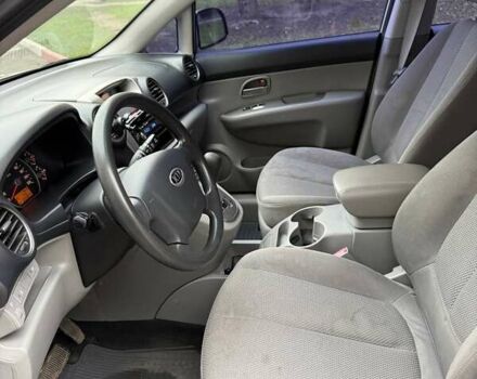 Серый Киа Каренс, объемом двигателя 2 л и пробегом 131 тыс. км за 8200 $, фото 25 на Automoto.ua