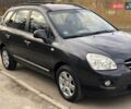 Серый Киа Каренс, объемом двигателя 2 л и пробегом 250 тыс. км за 7200 $, фото 1 на Automoto.ua