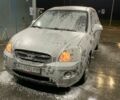 Серый Киа Каренс, объемом двигателя 2 л и пробегом 254 тыс. км за 5800 $, фото 1 на Automoto.ua