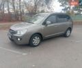Серый Киа Каренс, объемом двигателя 2 л и пробегом 235 тыс. км за 6000 $, фото 1 на Automoto.ua