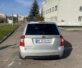 Сірий Кіа Каренс, об'ємом двигуна 2 л та пробігом 273 тис. км за 6300 $, фото 7 на Automoto.ua