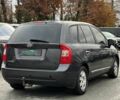 Серый Киа Каренс, объемом двигателя 2 л и пробегом 203 тыс. км за 5999 $, фото 8 на Automoto.ua