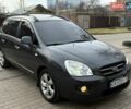 Сірий Кіа Каренс, об'ємом двигуна 2 л та пробігом 264 тис. км за 6450 $, фото 1 на Automoto.ua