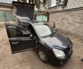 Серый Киа Каренс, объемом двигателя 2 л и пробегом 140 тыс. км за 8000 $, фото 1 на Automoto.ua