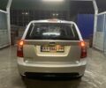 Серый Киа Каренс, объемом двигателя 2 л и пробегом 250 тыс. км за 5800 $, фото 6 на Automoto.ua