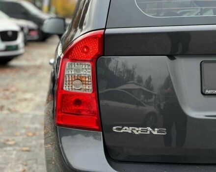 Серый Киа Каренс, объемом двигателя 2 л и пробегом 203 тыс. км за 5999 $, фото 10 на Automoto.ua