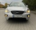 Сірий Кіа Каренс, об'ємом двигуна 2 л та пробігом 197 тис. км за 6499 $, фото 1 на Automoto.ua