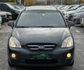 Серый Киа Каренс, объемом двигателя 2 л и пробегом 203 тыс. км за 5999 $, фото 2 на Automoto.ua