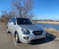 Серый Киа Каренс, объемом двигателя 2 л и пробегом 250 тыс. км за 4500 $, фото 1 на Automoto.ua