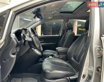 Сірий Кіа Каренс, об'ємом двигуна 2 л та пробігом 215 тис. км за 8990 $, фото 8 на Automoto.ua