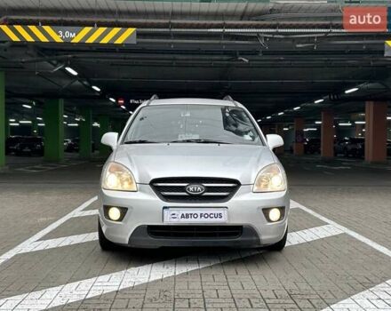 Сірий Кіа Каренс, об'ємом двигуна 2 л та пробігом 215 тис. км за 8990 $, фото 2 на Automoto.ua