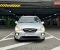 Сірий Кіа Каренс, об'ємом двигуна 2 л та пробігом 215 тис. км за 8990 $, фото 2 на Automoto.ua