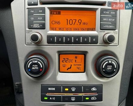 Сірий Кіа Каренс, об'ємом двигуна 2 л та пробігом 215 тис. км за 8990 $, фото 18 на Automoto.ua